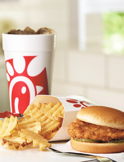 Chic-fil-a sandwich with fries and soda